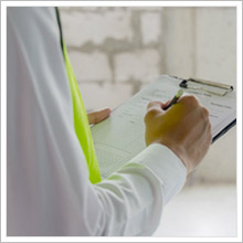 Workman performing a checklist